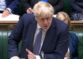 英下院で質疑応答に臨むボリス・ジョンソン首相。英議会提供の動画より（2022年1月12日撮影）。(c)AFP PHOTO / PRU