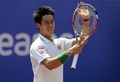 男子テニス、バルセロナ・オープン（Barcelona Open Banc Sabadell 2014）シングルス準決勝。勝利を喜ぶ錦織圭（Kei Nishikori、2014年4月26日撮影）。(c)AFP/JOSEP LAGO