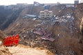 救助活動が続く土砂崩れの現場（2019年3月17日撮影）。(c)CNS/韋亮