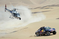 ダカールラリー2013（Dakar Rally 2013）は7日、第3ステージが行われ、四輪部門でバギー（Buggy）のナセル・アルアティア（Nasser Al-Attiyah、カタール）がステージ優勝を飾った。

レースに臨むバギーのナセル・アルアティア（2013年1月7日撮影）。(c)AFP/FRANCK FIFE