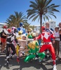 スペイン領カナリア（Canary）諸島、グランカナリア（Gran Canaria）島のマスパロマス（Maspalomas）で開催された同性愛者の祭典「ゲイ・プライド・マスパロマス（Gay Pride Maspalomas）2014」のパレードに参加する人々（2014年5月24日撮影）。(c)AFP/DESIREE MARTIN

