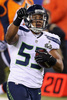 13NFL第48回スーパーボウル（Super Bowl XLVIII）、デンバー・ブロンコス（Denver Broncos）対シアトル・シーホークス（Seattle Seahawks）。インターセプトを奪い喜ぶシアトル・シーホークスのマルコム・スミス（Malcolm Smith、2014年2月2日撮影）。(c)AFP/Getty Images/Christian Petersen