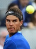 テニス、マドリード・オープン（Mutua Madrid Open 2014）男子シングルス決勝。ボールを見つめるラファエル・ナダル（Rafael Nadal、2014年5月11日撮影）。(c)AFP/PIERRE-PHILIPPE MARCOU