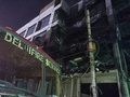 インド・ニューデリー西部マンドカで発生した火災現場付近に止められた消防車両（2022年5月14日撮影）。(c)Jalees ANDRABI / AFP