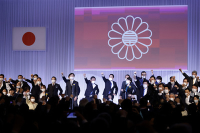Japan prosecutors raid ruling party offices over kickback scandal