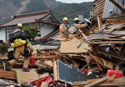「我々はあきらめない」、大船渡の被災地で活動する米救助隊