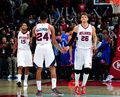 14-15NBA、アトランタ・ホークス対フィラデルフィア・セブンティシクサーズ。得点を喜び合うアトランタ・ホークスのケント・ベイズモア（左）とカイル・コーバー（2015年1月31日撮影）。(c)AFP/Getty Images/NBAE/Scott Cunningham
