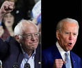 米民主党の大統領候補、バーニー・サンダース上院議員（左）とジョー・バイデン前副大統領（2020年3月4日作成）。(c)TIMOTHY A. CLARY and Frederic J. BROWN / AFP
