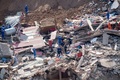 救助活動が続く土砂崩れの現場（2019年3月17日撮影）。(c)CNS/韋亮