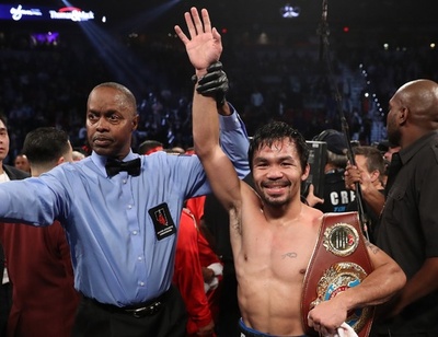 パッキャオが復帰戦で勝利、バルガス下しウエルター級王座獲得