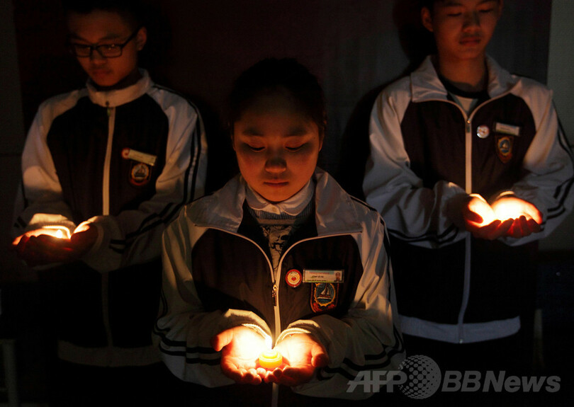 中国、マレーシア機捜索に衛星10基投入