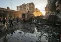 シリア北東部カミシリで起きた同時爆発の現場（2019年11月11日撮影）。(c)Delil souleiman / AFP