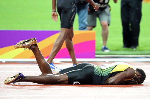 ボルト ラストランは悲しい幕切れ 負傷でリレー途中棄権 写真18枚 国際ニュース Afpbb News