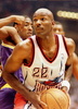 Clyde Drexler of the Houston Rockets (R) works against Los Angeles Laker Eddie Jones during first quarter action at The Summit in Houston, Texas 02 May. (c)AFP/Paul K. BUCK