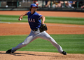12MLBオープン戦は13日、各地で行われ、テキサス・レンジャーズ（Texas Rangers）のダルビッシュ有（Yu Darvish）は、クリーブランド・インディアンス（Cleveland Indians）戦に先発し、3回を投げて3安打、4四球を与え2失点を喫した。

投球するレンジャーズのダルビッシュ有（2012年3月13日撮影）。(c)AFP/Getty Images/Kevork Djansezian