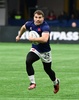 ワールドラグビーセブンズシリーズ、バンクーバー大会準決勝、ニュージーランド対フランス。ボールを持って走るフランスのアントワーヌ・デュポン（2024年2月25日撮影）。(c)Don MacKinnon/ AFP