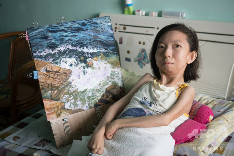 関節リウマチで全身不随の女性、絵を描き続け30年 中国・山西