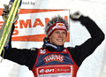 表彰台で歓喜する3位のトーマス・モルゲンシュテルン。(c)AFP/JANEK SKARZYNSKI