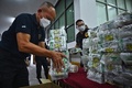 タイの麻薬取締局が押収した覚醒剤。タイのバンコクで（2023年1月24日撮影）。(c)Lillian SUWANRUMPHA / AFP