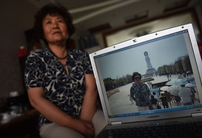 中国の活動家対策、強制休暇の「被旅遊」