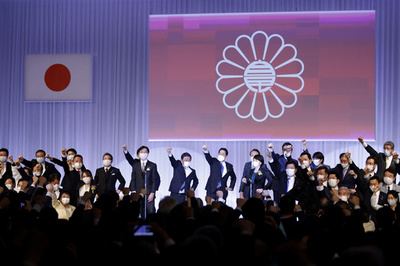 Japan PM grilled over 'go-go dancers' at party meet