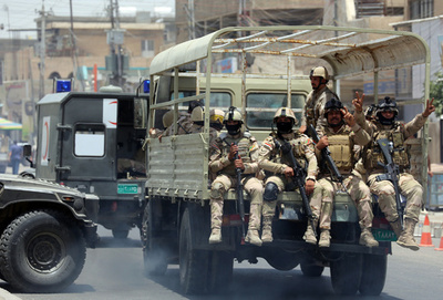 受刑者移送中のバスを武装集団が襲撃、60人死亡 イラク