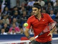 男子テニス、上海マスターズ（2014 Shanghai Rolex Masters）シングルス準決勝。リターンを狙うロジャー・フェデラー（Roger Federer、2014年10月11日撮影）。(c)AFP/GOH CHAI HIN