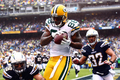 11NFLは6日、各地で第9週の試合が行われ、グリーンベイ・パッカーズ（Green Bay Packers）は45-38でサンディエゴ・チャージャーズ（San Diego Chargers）を下し、開幕から唯一続けている無敗記録を守った。

第1クォーターにタッチダウンパスをレシーブするパッカーズのジャーマイケル・フィンリー（Jermichael Finley、2011年11月6日撮影）。(c)AFP/Getty Images/Donald Miralle