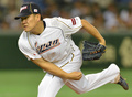 第3回ワールド・ベースボール・クラシック（2013 World Baseball Classic、WBC）は12日、東京で2次ラウンドの1位決定戦が行われ、大会3連覇を狙う日本は10-6でオランダを下し、2次ラウンド首位通過を決めた。

5回に3番手として登板する日本の田中将大（Masahiro Tanaka、2013年3月12日撮影）。(c)AFP/KAZUHIRO NOGI
