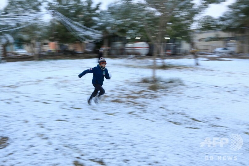 イラク首都にごく珍しい雪、過去100年で2回目