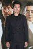 韓国・ソウル（Seoul）の大型映画館チェーン「メガボックス（Megabox）」・東大門（Dongdaemun）店で行われた、アクション映画『神の一手（英題、The Divine Move）』のマスコミ向け試写会に臨む、主演のチョン・ウソン（Jung Woo-Sung、2014年6月24日撮影）。(c)STARNEWS