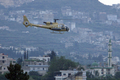 2007年6月2日、ナハル・アルバレド（%%Nahr al-Bared%%）パレスチナ難民キャンプの攻撃後、基地に帰還する攻撃ヘリコプター。(c)AFP/RAMZI HAIDAR