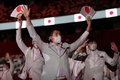 国立競技場で開催された東京五輪の開会式で、入場行進する日本選手団（2021年7月23日撮影）。(c)HANNAH MCKAY / POOL / AFP