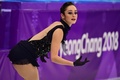平昌冬季五輪、フィギュアスケート女子シングル・ショートプログラム（SP）の演技に臨むケイトリン・オズモンド（2018年2月21日撮影）。(c)AFP/Roberto SCHMIDT