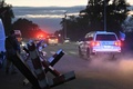 ウクライナ南東部のザポリージャ原子力発電所の視察を終え、ザポリージャ市近郊の道路を走る国際原子力機関（IAEA）の調査団を乗せた車（2022年9月1日撮影）。(c)Genya SAVILOV / AFP