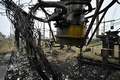 ロシア軍のミサイルで破壊されたウクライナ国営電力会社ウクルエネルゴの高圧変電所（2022年11月10日撮影）。(c)Genya SAVILOV / AFP