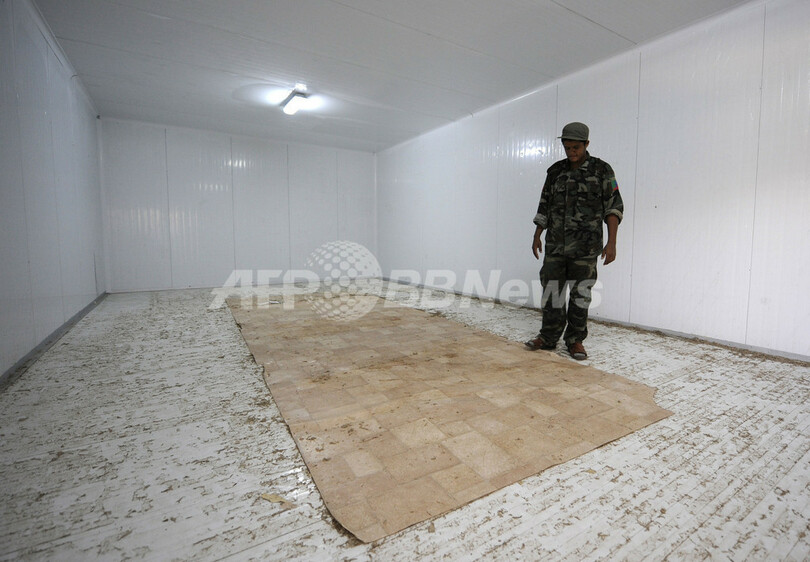 カダフィ大佐と四男、極秘の場所に埋葬 次男は近くニジェール入りか