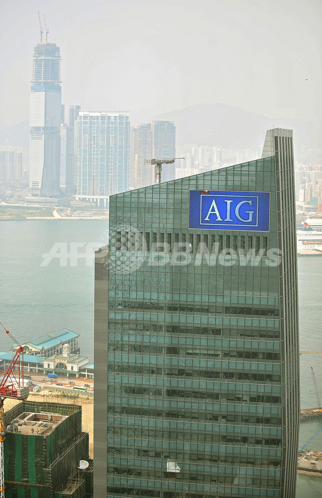 大手保険AIG格付け、米三大機関が引き下げ