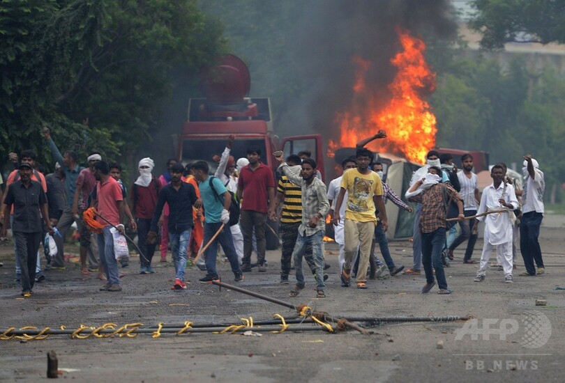 信者暴徒化で32人死亡 インド、宗教指導者への有罪判決に反発