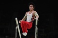 リオデジャネイロ五輪、体操男子予選。平行棒の演技に臨む加藤凌平（2016年8月6日撮影）。(c)AFP/Ben STANSALL