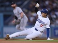 24MLB、ロサンゼルス・ドジャース対コロラド・ロッキーズ。3回に盗塁を成功させるロサンゼルス・ドジャースの大谷翔平（2024年6月1日撮影）。(c)Harry How/Getty Images/AFP