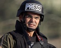 対シリア国境に近いトルコ・ウルファで取材を行うトルコ人報道カメラマンのブンヤミン・アイギュン氏（2012年11月11日撮影）。(c)AFP / Bulent Kilic