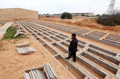リビアの「無名墓地」、祖国帰還望む難民遺族