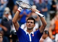 全米オープンテニス、男子シングルス1回戦。勝利を喜ぶノバク・ジョコビッチ（2015年8月31日撮影）。(c)AFP/Getty Images/Michael Heiman