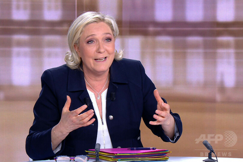 マクロン氏 「偽ニュース」拡散で告訴 ルペン氏が言及、仏大統領選