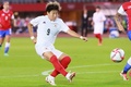 東京五輪、サッカー女子1次ラウンド・グループE、チリ対日本。シュートを打つ菅澤優衣香（2021年7月27日撮影）。(c)Kohei CHIBAHARA / AFP