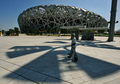中国・北京（Beijing）のオリンピック公園（Olympic Park）にある、「鳥の巣（Bird&apos;s Nest）」の愛称を持つ北京五輪のメーンスタジアム、国家体育場（National Stadium、2008年8月2日撮影）。(c)AFP/TEH Eng Koon