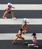 第13回世界陸上大邱大会（13th IAAF World Championships in Athletics Daegu）は31日、5日目の競技が行われ、女子20キロメートル競歩決勝でロシアのオリガ・カニスキナ（Olga Kaniskina）が1時間29分42秒で優勝し、大会3連覇を果たした。

レースに臨む選手（2011年8月31日撮影）。(c)AFP/MARK RALSTON