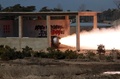 北朝鮮の国営朝鮮中央通信（KCNA）が配信した、固体燃料ロケットエンジン試験の写真（2016年3月24日配信）。(c)AFP/KCNA VIA KNS