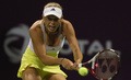 女子テニス、カタール・トータル・オープン（Qatar Total Open 2013）は15日、カタールのドーハ（Doha）でシングルス準々決勝が行われ、大会第10シードのカロリーネ・ボズニアツキ（Caroline Wozniacki、デンマーク）は2-6、5-7で第4シードのアニエスカ・ラドワンスカ（Agnieszka Radwanska、ポーランド）に敗れた。

リターンを打つカロリーネ・ボズニアツキ（2013年2月15日撮影）。(c)AFP/AL-WATAN DOHA/KARIM JAAFAR